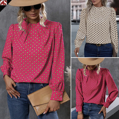 Damebluse med elegant spidsedetalje og blomstret design Stilla