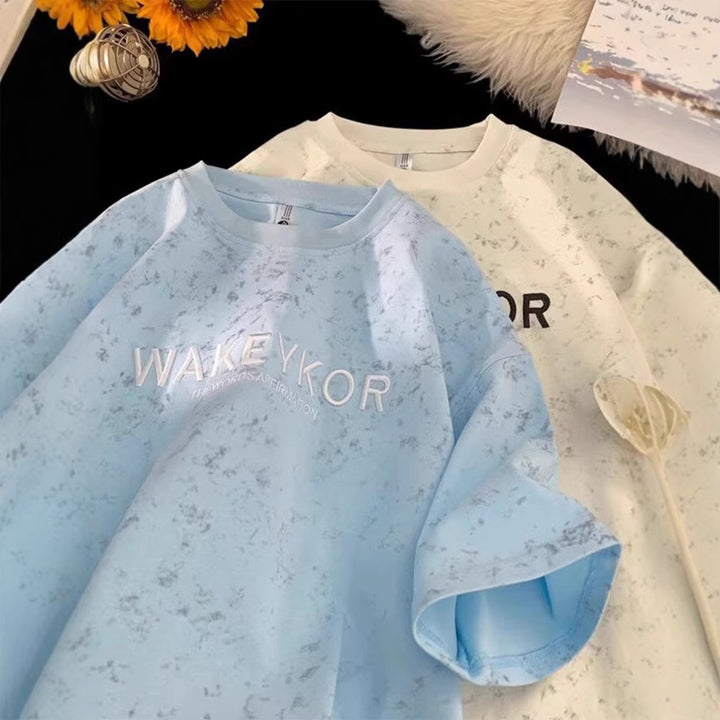Dame Oversized T-shirt med kreativ tekst og unikt design Stilla