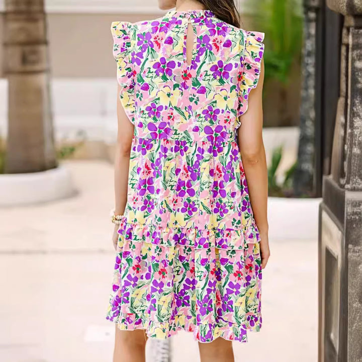Dame sommerligt tunika-kjole med flæsedetaljer og blomstret design Stilla