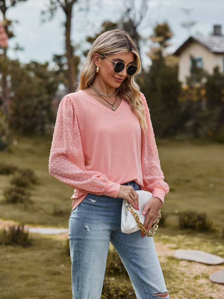 Damebluse med puffærmer og struktureret design Stilla