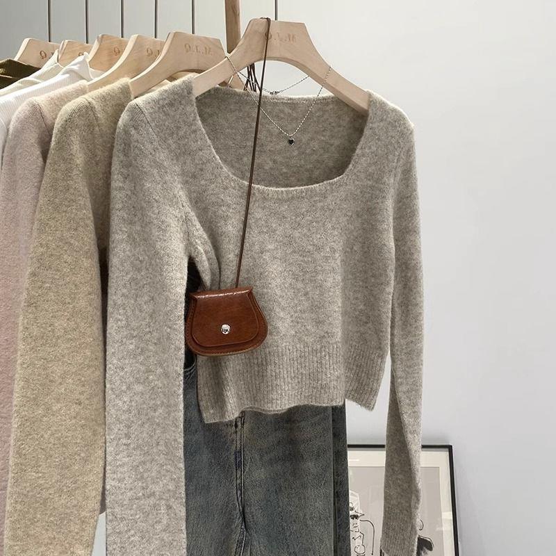Kvinders fashionable sweater med bred rund halsudskæring og fin tekstur Stilla