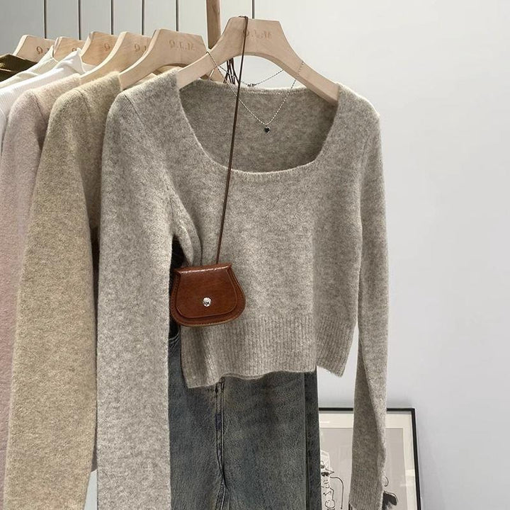 Kvinders fashionable sweater med bred rund halsudskæring og fin tekstur Stilla