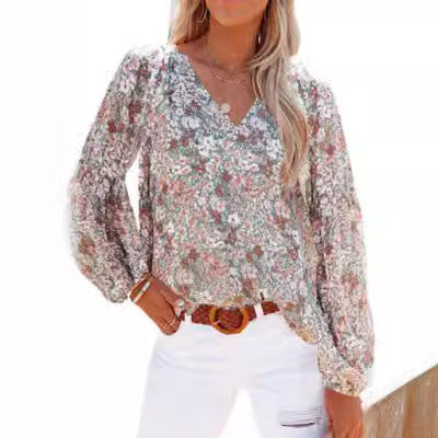 Damebluse med blomster mønstre og vidde ballonærmer Stilla