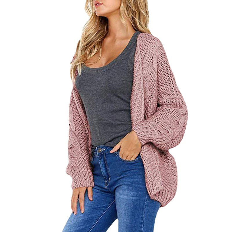 Kvinders chunky strikket cardigan med elegant kabelmønster og løs pasform Stilla
