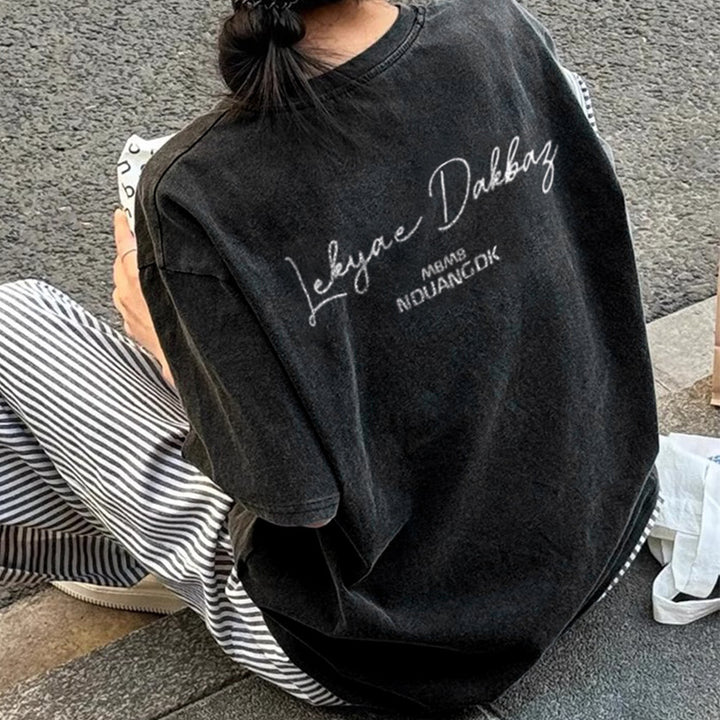 Dame Trend T-shirt med moderne skrift og afslappet snit Stilla