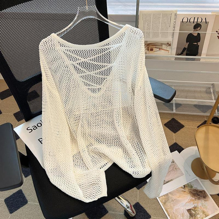 Kvindernes mesh sweater med åben snit og dyb V-hals Stilla