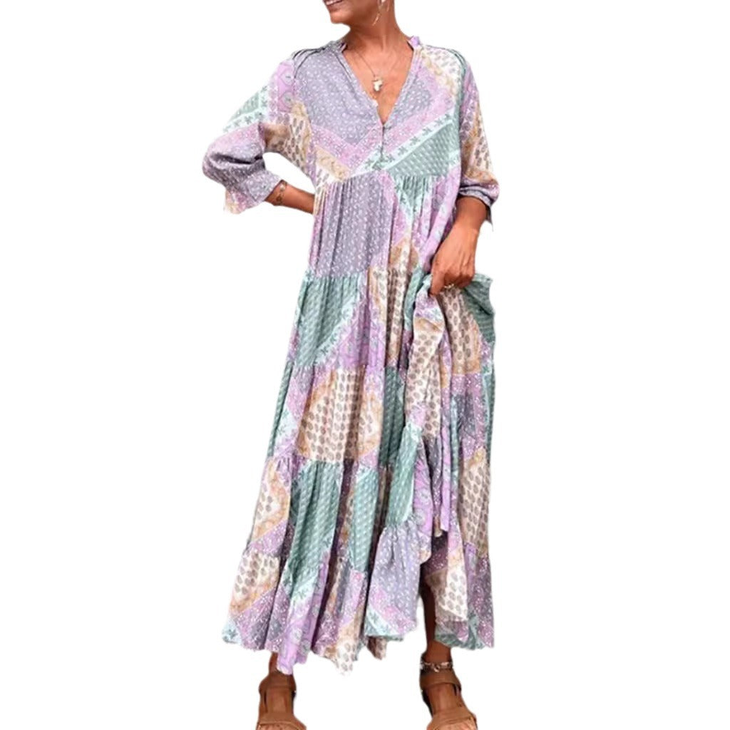 Dame maxidedragt med unikt patchwork-design og sidelommer Stilla