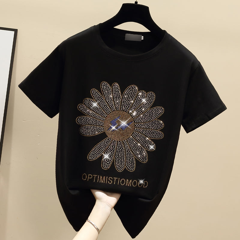 Dame T-shirt med kreativ glimmer-blomstermotiv og inspirerende tekst Stilla