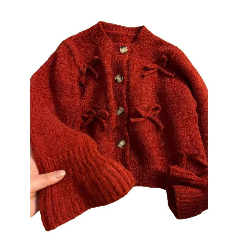 Kvinders cardigan med dekorative sløjfer på