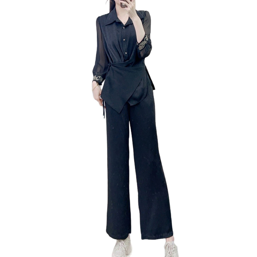 Dame Elegant og behagelig bluse med vide bukser Stilla