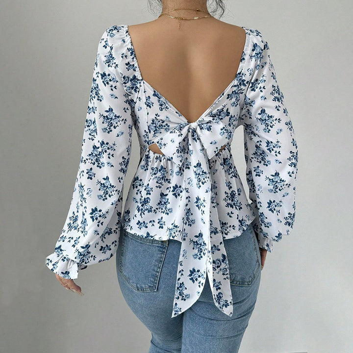 Kvinders bluse med blomstermønster og voluminøse ærmer Stilla