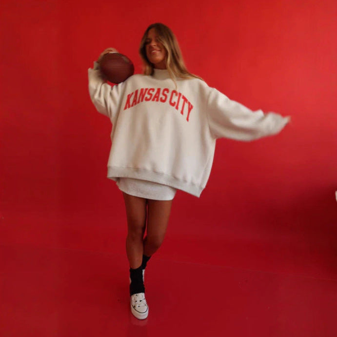 Damers oversized sweatshirt med et sødt bjørnemotiv Stilla