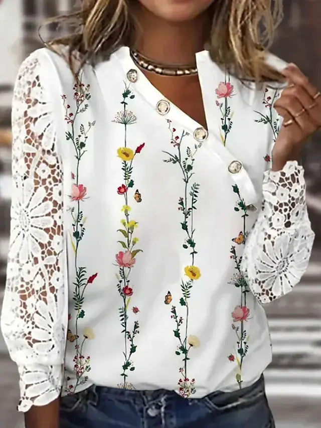 Dame elegant bluse med spidsærmer og knapdetaljer Stilla