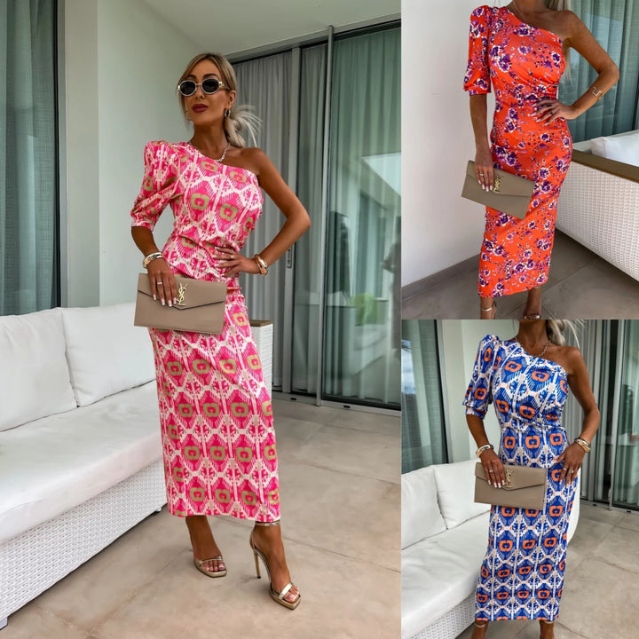 Dame asymmetrisk maxikjole med elegant one-shoulder-design og moderne mønstertryk Stilla