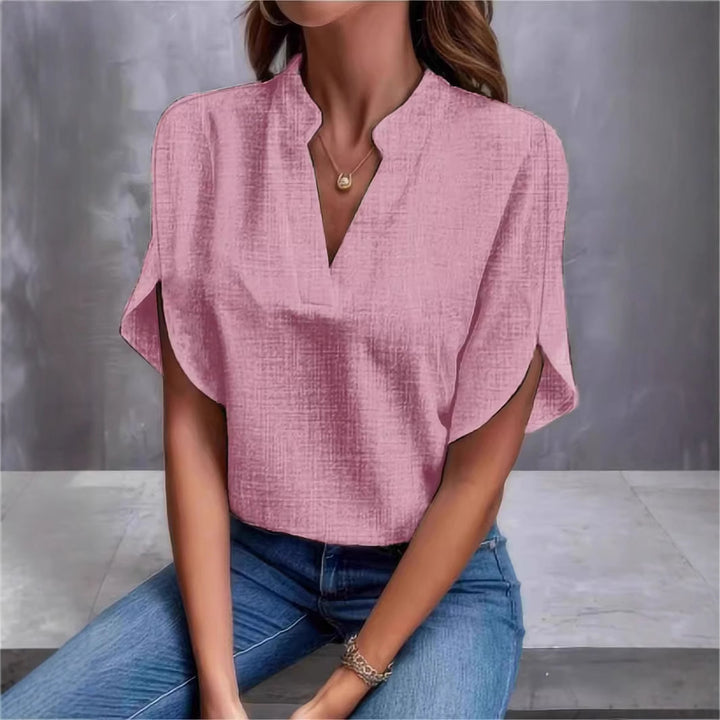 Dame elegant kortærmet bluse med moderne ståkrave og casual sideslidser Stilla