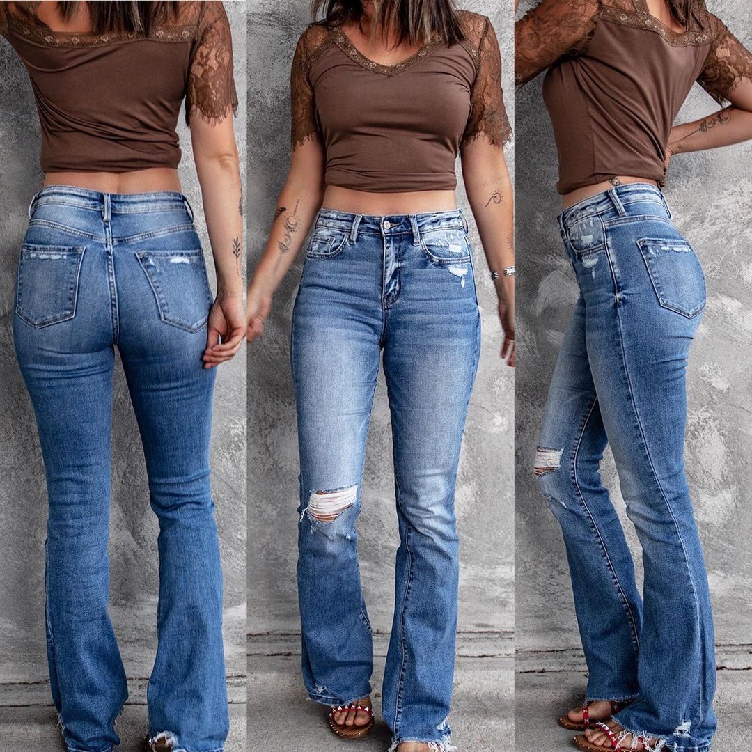 Dame brede flared jeans med moderigtige destroyed-look og høj talje Stilla