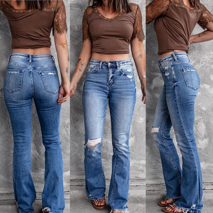 Dame brede flared jeans med moderigtige destroyed-look og høj talje Stilla