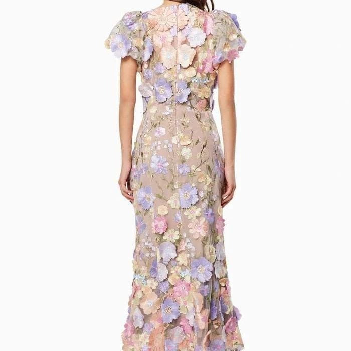 Dame Elegant blomsterkjole med transparent tyl og voluminøse pufærmer Stilla