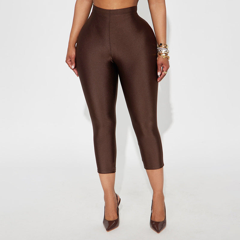 Damen Figurbetonte Capri-Leggings mit Hochbund und luxuriösem Glanz Skovae