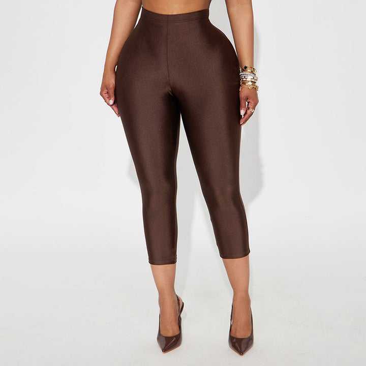 Damen Figurbetonte Capri-Leggings mit Hochbund und luxuriösem Glanz Skovae