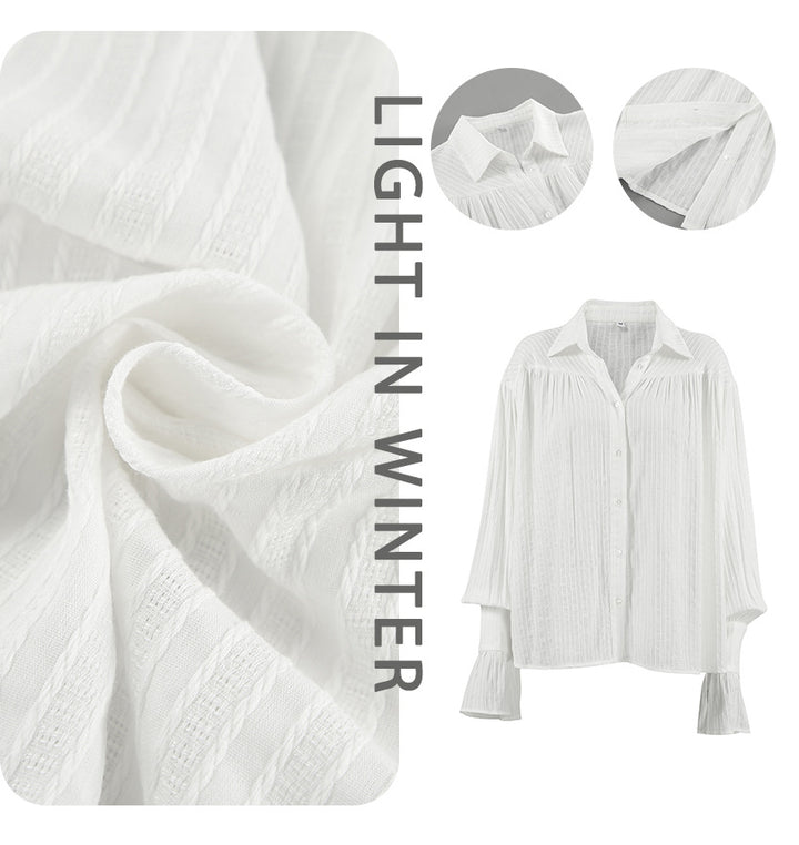 Dame Oversized Bluse med voluminøse ærmer og struktureret design Stilla