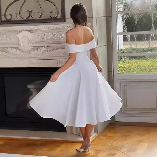 Dame Off-Shoulder Midikjole med elegant snit og lommer Stilla