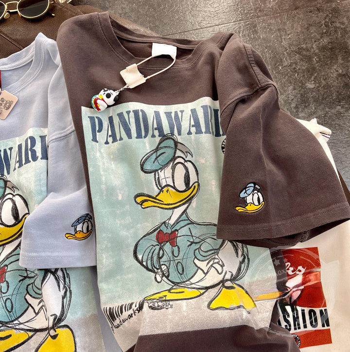 Dame T-shirt i vintage-look med kreativt cartoon-tryk Stilla