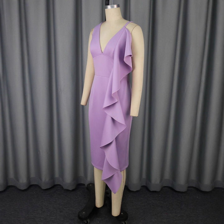 Dame figursyet kjole med asymmetrisk flæsedesign Skovae