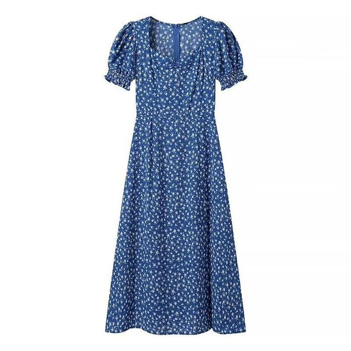Dame blomster maxikjole med korte puffærmer og elegant snit Stilla