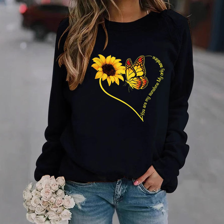 Kvinders sweatshirt med grafisk sommerfugl og solskinsmotiv Stilla