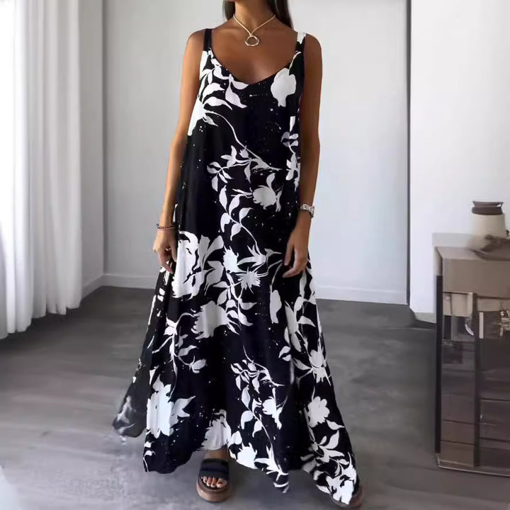Dame maxikjole med floral snit og flydende materiale Stiila