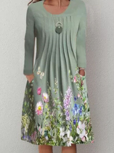 Dame fritidskjole med blomstret design og lommer Stilla