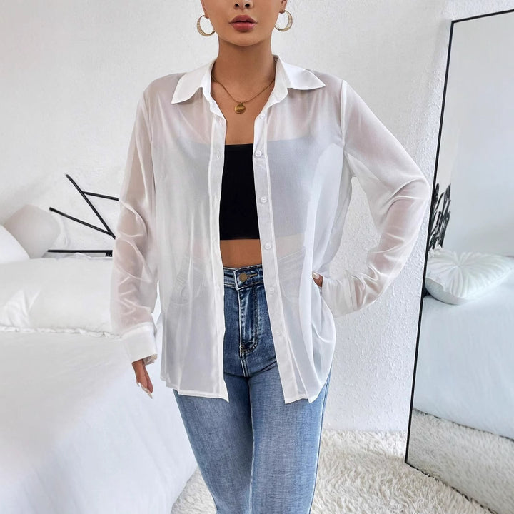 Dame afslappet transparent bluse med knaplukning og manchetter Stilla