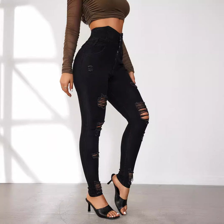 Dame Højtaljede Skinny Jeans i moderne Destroyed-look med knapdetaljer Stilla