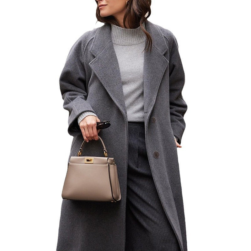 Dame Elegant Uldfrakke i Oversized-snit med dyb revers og praktiske lommer Stilla