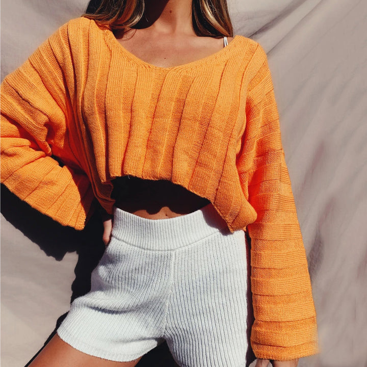 Kvinders afslappede strikket sweater med cropped snit og lange ærmer