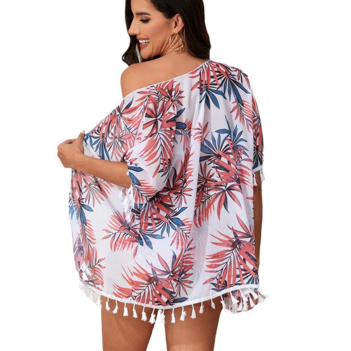 Dame elegant strandoutfit med floral overtræk og matchende bikini Skovae