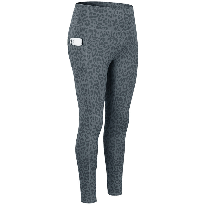 Dame Kvalitets Performance-Leggings med praktiske sidelommer og elastisk talje Stilla
