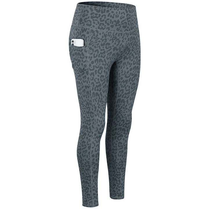 Dame Kvalitets Performance-Leggings med praktiske sidelommer og elastisk talje Stilla