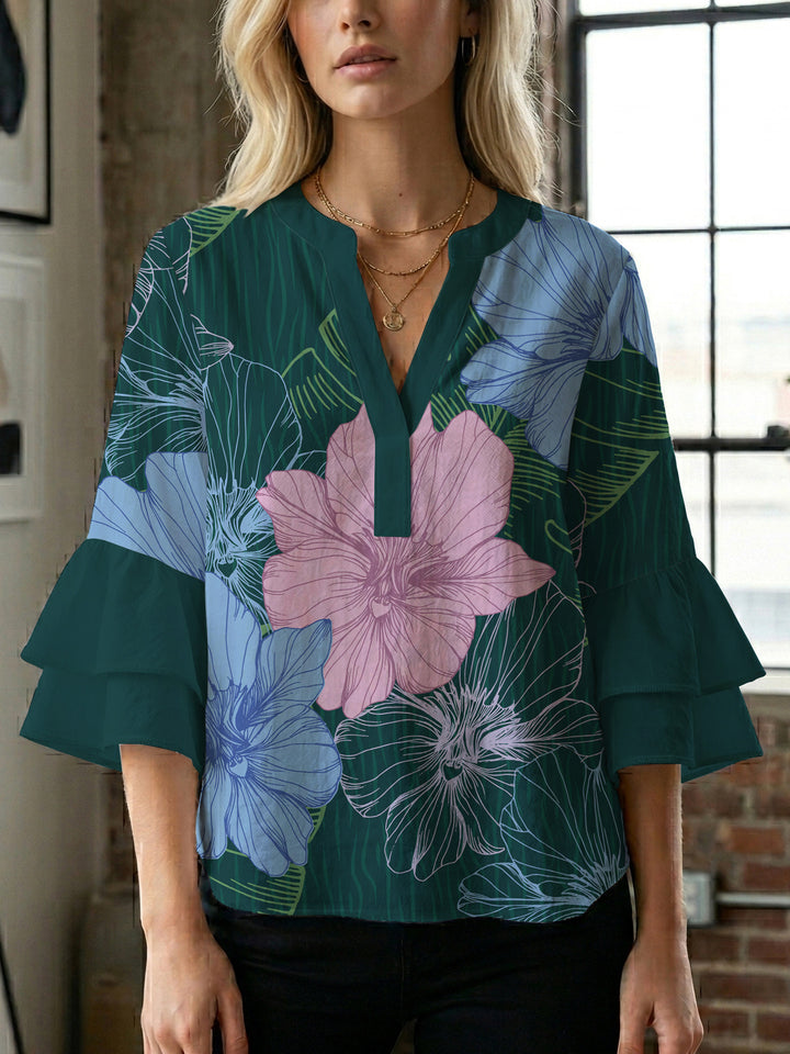 Dame skjorte med voluminøse ærmer og blomsterdesign Skovae