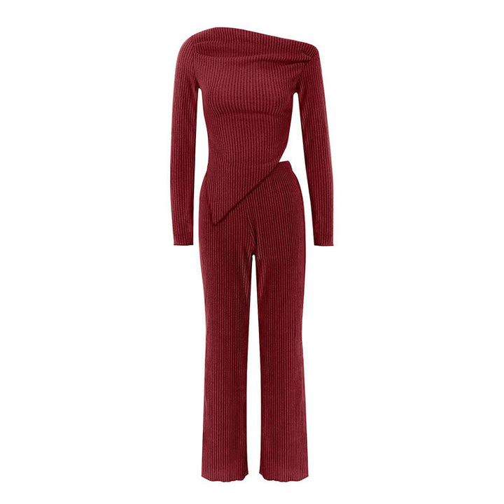 Dame tætsiddende jumpsuit med asymmetrisk udskæring og lange ærmer Skovae