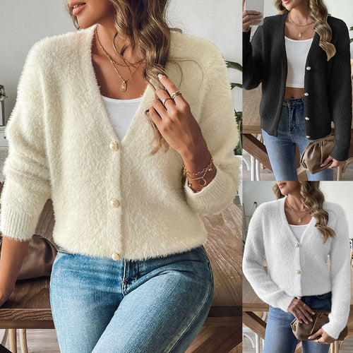 Dame hyggelig strikjakke i blødt boucle-materiale med elegante metalknapper Stilla