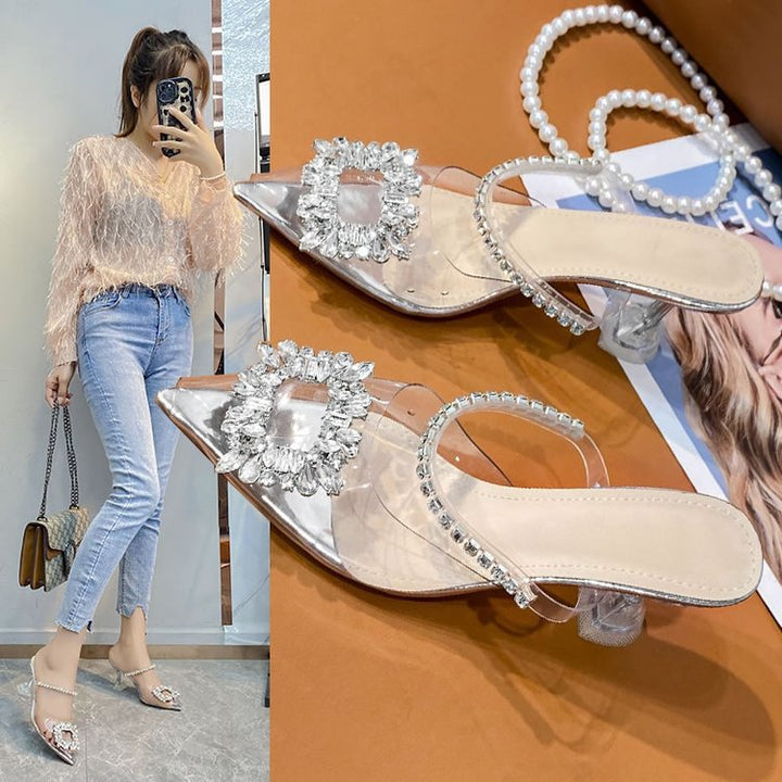 Dame Slingback-pumper med glitrende smykkedetalje og transparent overmateriale Stilla