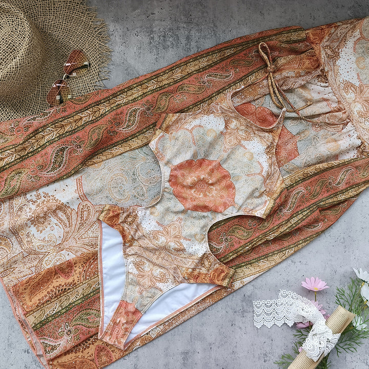Dame badedragt med blomster cut-out design og elegant trusse Stilla