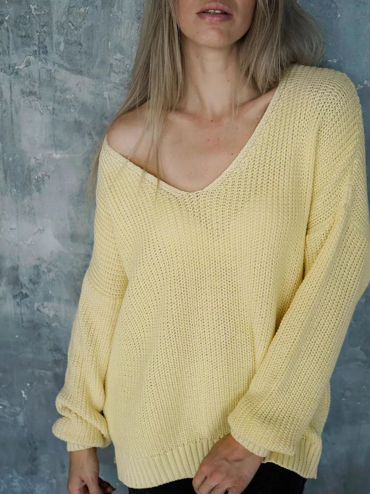 Dame Oversized Strikbluse med asymmetrisk udskæring og brede ribstrikdetaljer Stilla