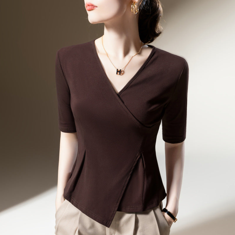 Dame indpakningsbluse med halværmet design og moderne snit Stilla