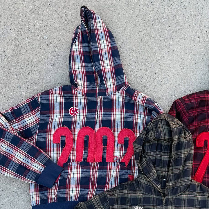 Kvinders afslappede hoodie bluse med ternet mønster og voluminøse ærmer Stilla