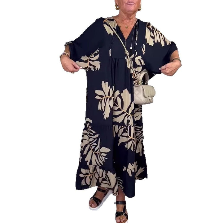 Dame maxikjole med blomsterdesign og flydende snit Stilla