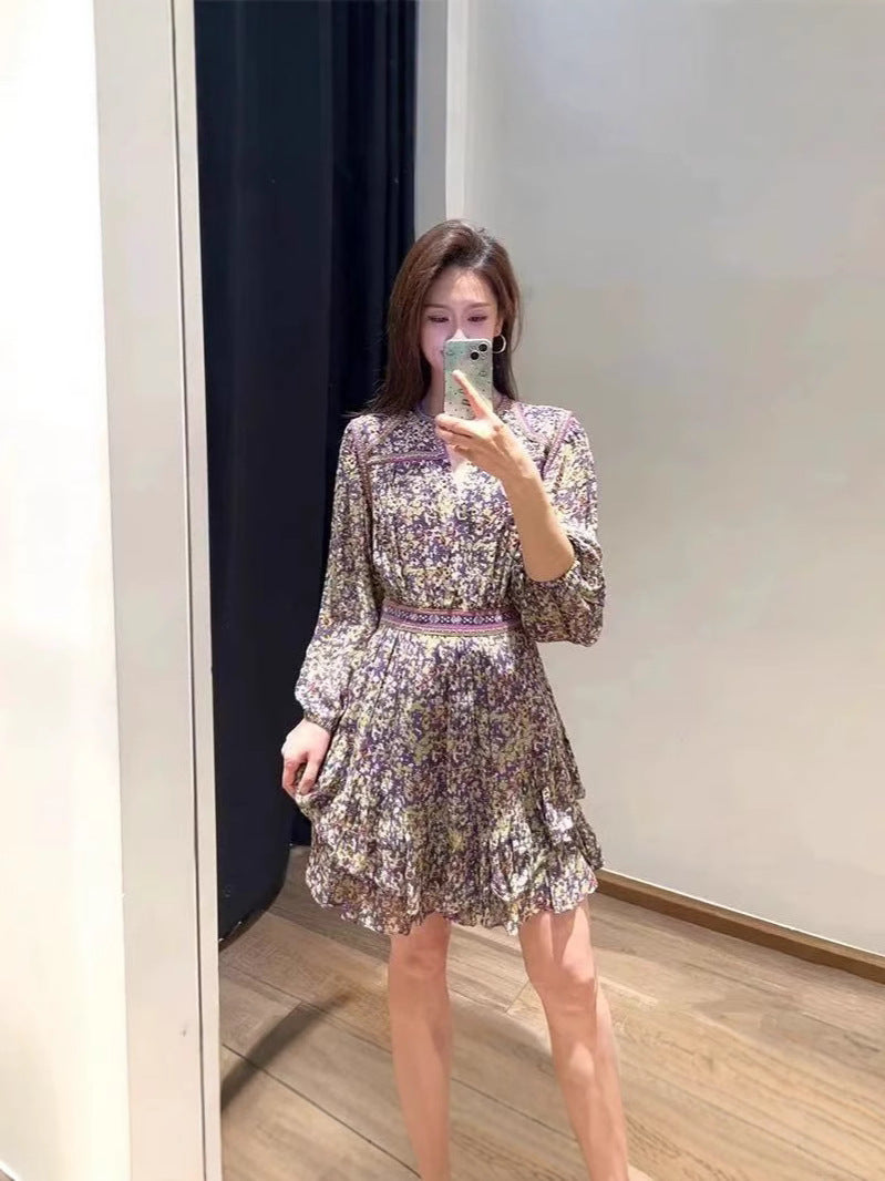 Damebluse med voluminøse ærmer og floralt flæsedesign Stilla