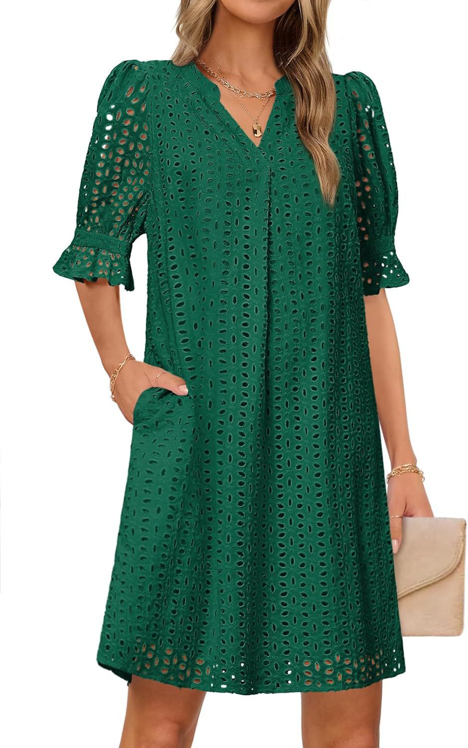 Dame fritidskjole med elegant hulbroderi og praktiske lommer Stilla